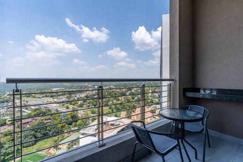 Balcony/terrace, Top Floor Menlyn Maine studio apartment with Stunning Views & No Load Shedding in Pretoria