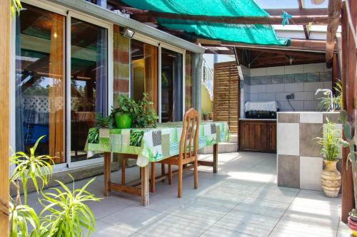Studio charmant à L'Étang-Salé, jardin et vues, 25 m² - Location saisonnière - L'Étang-Salé