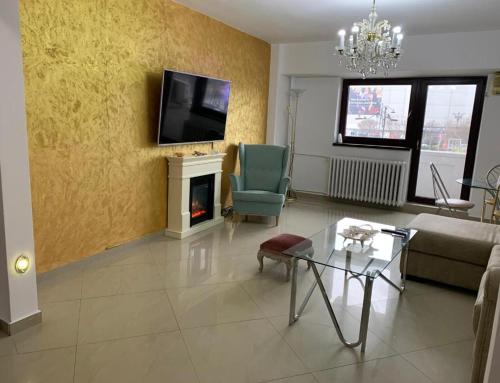 Three-Bedroom Apartment with Balcony and City View