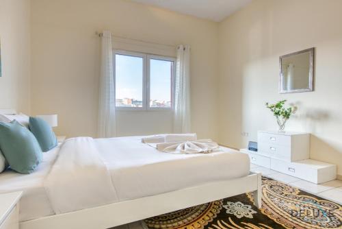 Bright 1BR Apartment in Mediterranean 74 Jebel Ali by Deluxe Holiday Homes