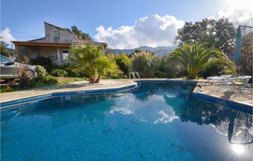 Awesome home in Petreto Bicchisano with 2 Bedrooms, WiFi and Swimming pool