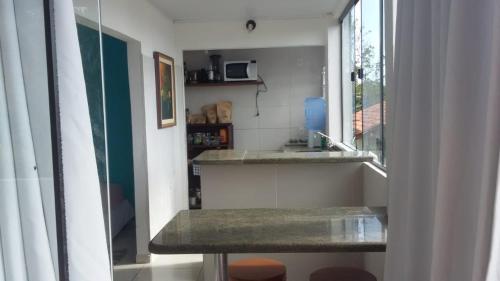 Kitchen, Casa 2 suites Lagoa Conceicao Praia Mole in Mole Beach