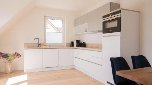ห้องครัว, Haus am Dünenwald Düne 4 (Haus am Dunenwald Dune 4) in ซิงสท์