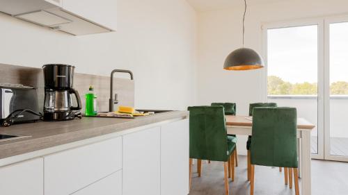 Kitchen, Apartmenthaus Wittsande Wittsande 11 in Zingst