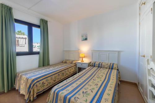 Apartamentos Flamingo The 2-star Apartamentos Flamingo offers comfort and convenience whether youre on business or holiday in Puerto del Carmen. The hotel has everything you need for a comfortable stay. Free Wi-Fi in all 