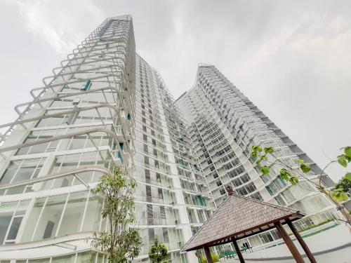 Vue extérieure,  avec 1&nbsp;chambre(s) de 27&nbsp;m² et 1&nbsp;salle(s) de bains privée(s) à Karawaci (Studio Comfort Majestic Point Serpong By Travelio) in Medang