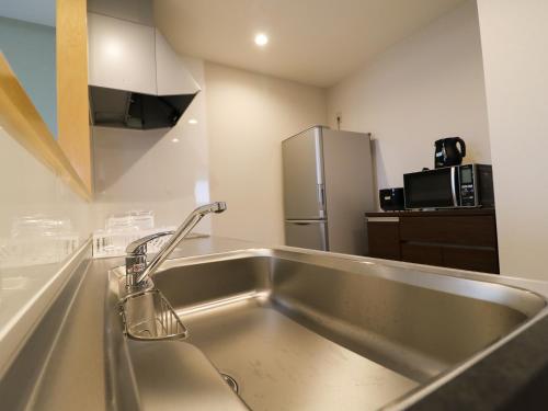 Kitchen, Bears Stay Kumejima Eef Beach in Kumejima