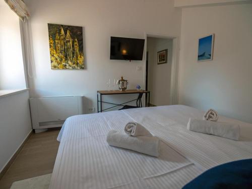 Rooms by the sea Rab - 3208