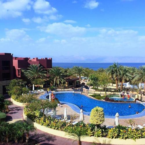 B&B Aqaba - Gorgeous Pool View Apartment - Tala Bay Resort, Aqaba - Bed and Breakfast Aqaba