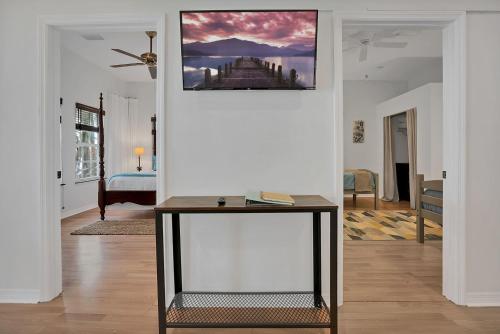 Riverfront Duplex with Dock, Fishing, Charcoal BBQ, AMAZING Sunsets!!