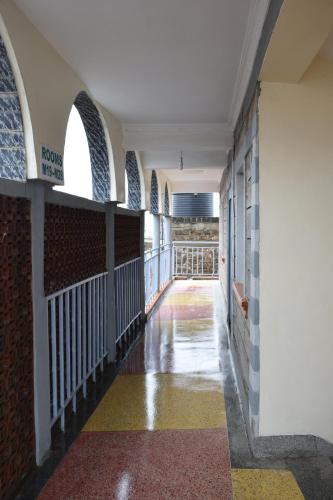 ระเบียง/ชานเรือน, Caphill Hotel in อึมโลลองโก