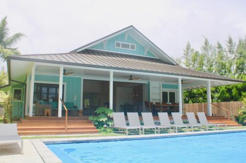 Gorgeous Renovated 1937 Plantation Style Beach House 50 Steps to the Center of the Beach home - main image