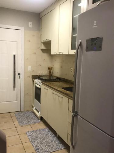 Apartamento Duplex em Itapema a 250 metros do mar in อิตาเปม่า