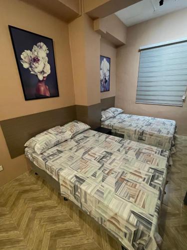 Staycation NETFLIX WIFI THOUSAND CABLE CHANNELS GAMES AND BOARD GAMES FIBER NET COZY COMFY STAY RELAX, Manila (fotografie 8)