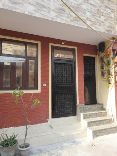 Couple friendly private flat in posh area of lajpat nagar, for more details cal 92,121,74700