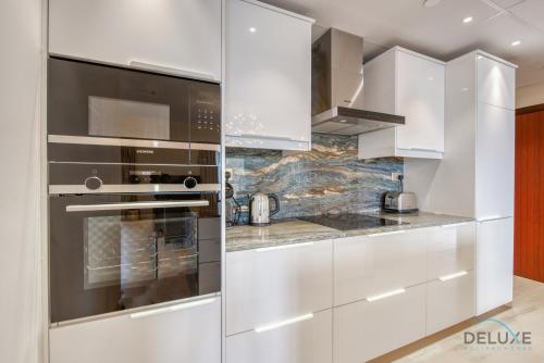 Glamorous 1BR Apartment in Rimal 3 Jumeirah Beach Residence by Deluxe Holiday Homes, Dubaj (fotografie 4)