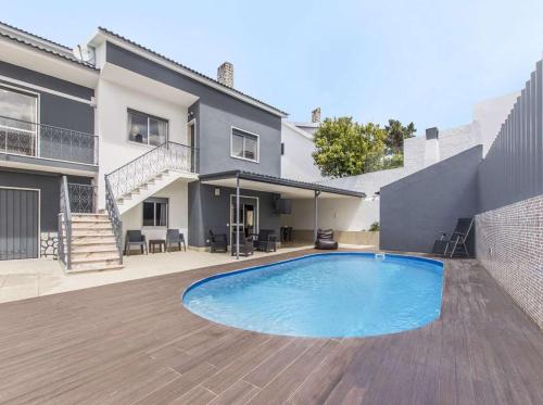 Stunning Aroeira Villa Villa Liri Gold 9 Bedrooms Pool Table and Gym Perfect for Families gîte à louer Quinta do Conde da Cunha