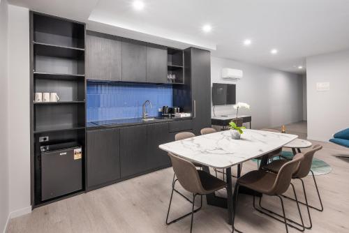 Kitchen, Oros Plus Hotel in Oakleigh