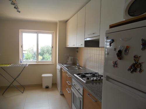 ห้องครัว, Apartamentos Cabanas Golf in กอนเซเซา