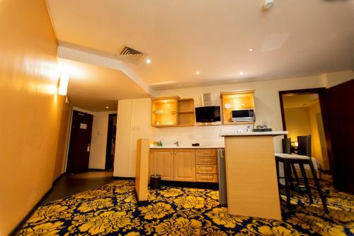 مطبخ, فندق بست ويسترن بريمير مطار أكرا (Best Western Premier Accra Airport Hotel) in رومان ريدج