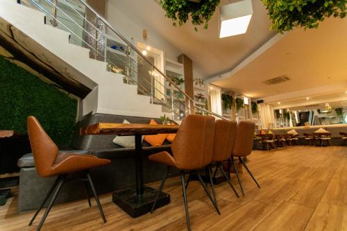 مطعم, فندق بست ويسترن بريمير مطار أكرا (Best Western Premier Accra Airport Hotel) in رومان ريدج