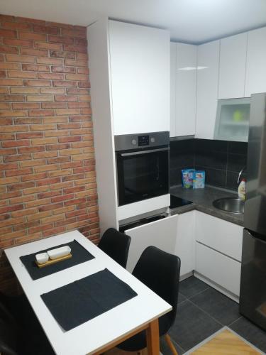 Small (34m2) modern apartment with parking place - image 3