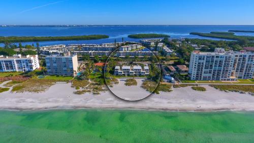 LaPlaya 202E Catch the gentle Gulf breezes on your private balcony beneath the swaying palms