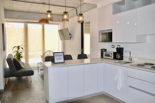 Cocina, Cozy Stays Cayala Apartments 4 in Zona 16