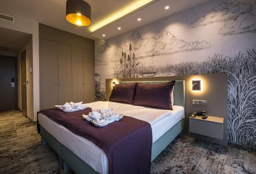1 doppelbett oder 2 einzelbetten, deluxe, seitlicher seeblick