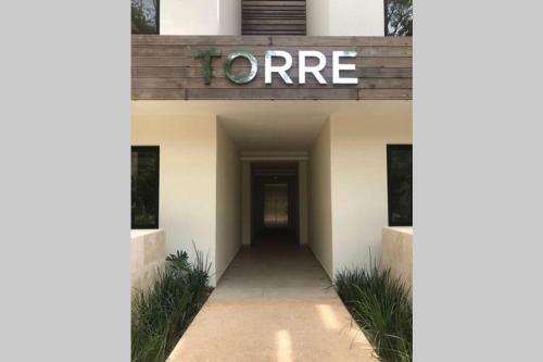 Jungle nested Condo, minutes away from the beach