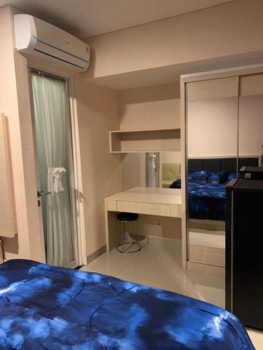 Apartement Grand Kamala Lagoon bekasi by ROOM IN