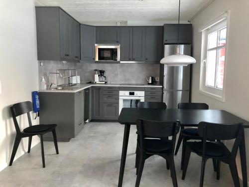 Kitchen, Soukolo Apartments in Helukka