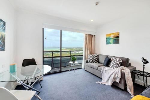 Skyline Sojourn Studio with Parking and Sea Views