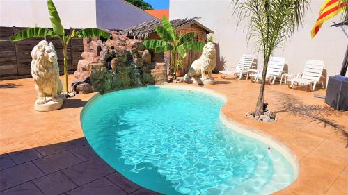 Beautiful air-conditioned villa with all mod cons with private pool, waterfall and garden gîte à louer Elne