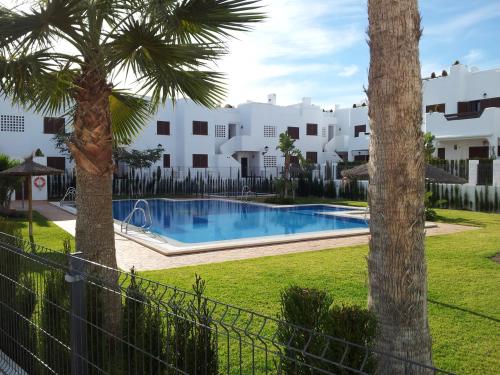  Homes of Spain, Mar de Pulpi fase 1, Apartamento primera linea de playa, bajo con jardin y WIFI in 04648 San Juan de los Terreros