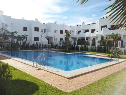  Homes of Spain, Mar de Pulpi fase 1, Apartamento primera linea de playa, bajo con jardin y WIFI in 04648 San Juan de los Terreros