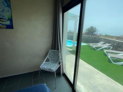 2 bedrooms villa with sea view private pool and enclosed garden at El Roque El Cotillo 1 km away from the beach