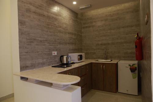 Cocina, فندق المستقبل للشقق الفندقية ALMUSTAQBAL HOTEL Apartments in Al Wasil