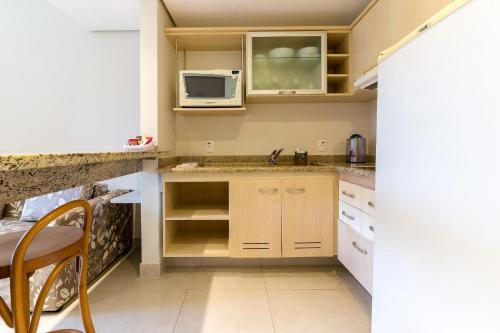 Apartamento em resort pe na areia em Jurere JBVSUP