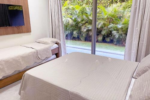 Qavi - Flat completo com vista para o jardim #ÎledePipa