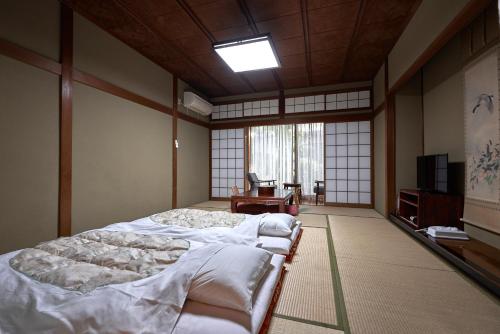 Japanese-Style Superior Room with Private Bathroom room in Ryokan Yamamuro