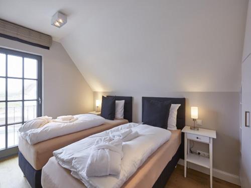 Reetland am Meer Luxus Reetdachvilla mit 3 Schlafzimmern Sauna und Kamin - image 2