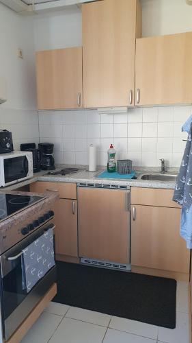 廚房, Pension Küstenkind (Pension Kustenkind) in 本特維施