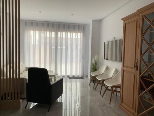 ห้องส่วนกลางสำหรับนั่งเล่น/ดูทีวี, Casa de invitados con piscina privada y WIFI in มอนเตียกูโด