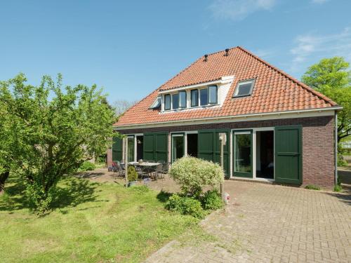 Spacious farmhouse in wooded area