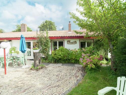 Holiday home in Schoorl with a garden