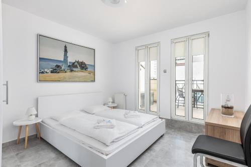 Three-Bedroom Apartment room in Penthouse Baltic Park by Noclegi Renters