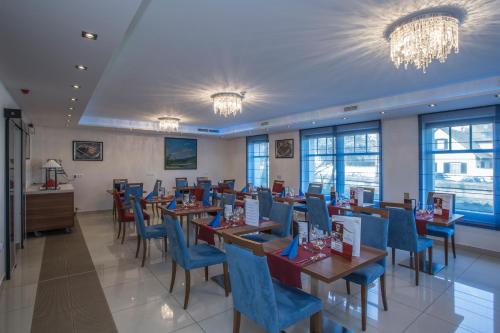 Restaurant, Bukkos Hotel & Spa in Szigetmonostor