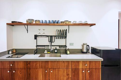 Kitchen, NATURA Loft Garden in Santa Teresa