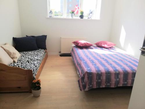 5 min walk to Lego house - 80m2 - 2 bedroom apartment with garden
